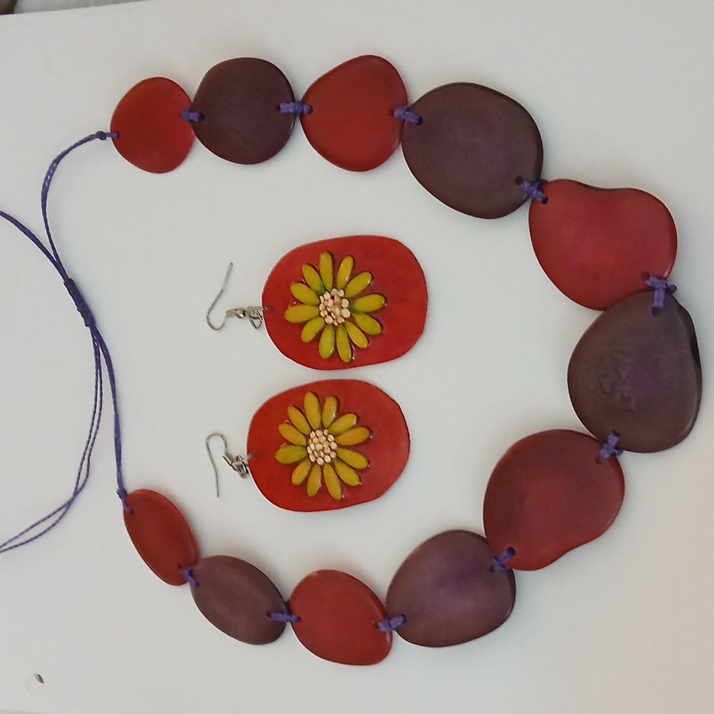 NWOT Handcrafted Bold Pink  and Purple  Tagua Necklace and Coconut Earring Set .